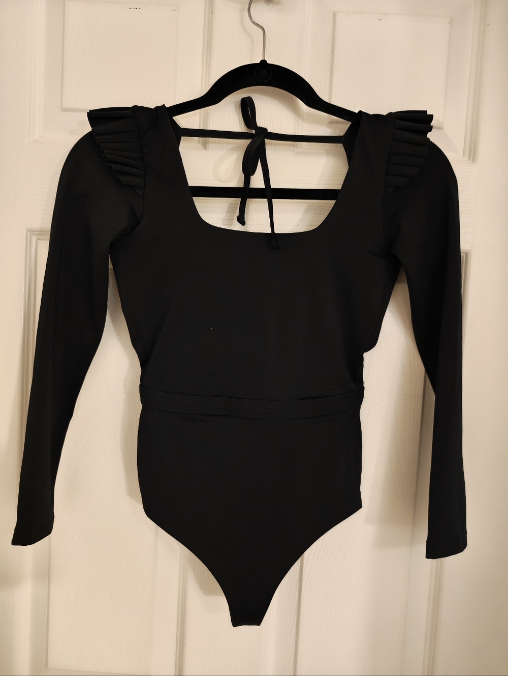Puntamar Agnes Black Long Sleeve One-Piece with Ruffle Shoulders